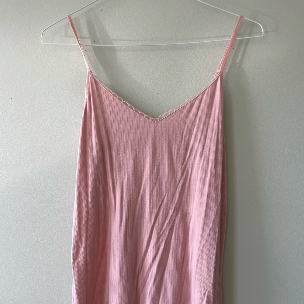 Light pink, v-neck with lace trim.